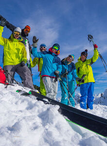 A happy group of friends on the ski slope.